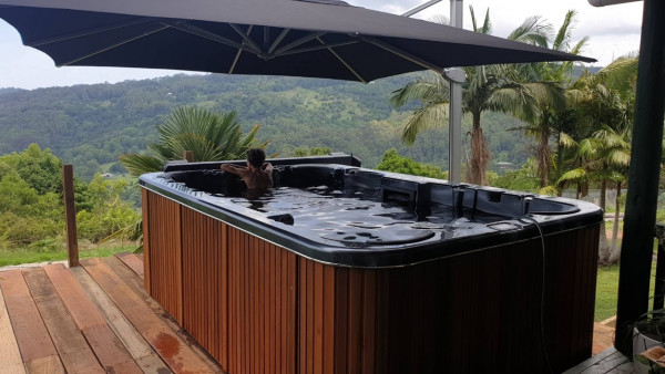 Large Spa pool with umbrella and mountain view 